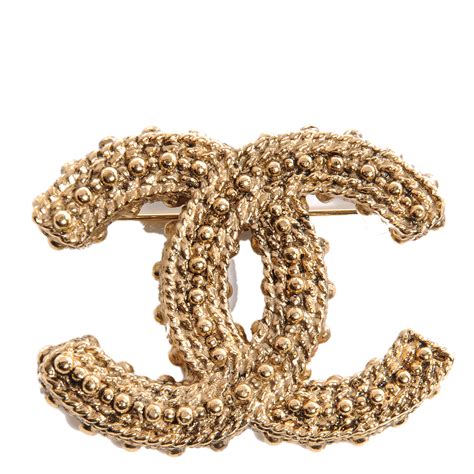 big cc gold chanel brooch|chanel brooch price.